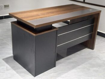 office table, office desk table, office workstation table, executive office table, executive office desk, manager office table, director office desk, CEO office table, computer office table, laptop office table, writing office table, study office table, home office table, corporate office table, commercial office table, modern office table, contemporary office desk, minimalist office table, luxury office table, premium executive desk, budget office table, affordable office desk, wooden office table, solid wood office table, engineered wood office desk, MDF office table, plywood office desk, metal office table, steel frame office desk, glass top office table, tempered glass office desk, marble top office table, laminate office desk, high gloss office table, matte finish office desk, white office table, black office desk, brown office table, walnut office desk, oak office table, mahogany office desk, teak office table, grey office desk, L shaped office table, corner office desk, U shaped office desk, rectangular office table, square office desk, compact office table, small office desk, large office table, long office desk, wide office table, narrow office desk, space saving office table, foldable office table, folding office desk, wall mounted office table, floating office desk, height adjustable office table, adjustable desk table, standing office table, sit stand desk table, electric standing desk, manual height adjustable desk, ergonomic office table, ergonomic desk workstation, office table with drawers, office desk with storage, office table with cabinet, office desk with shelves, office table with keyboard tray, office desk with CPU stand, office table with cable management, office desk with grommet hole, office table with modesty panel, executive desk with side return, office table with pedestal drawers, office desk with lockable drawers, workstation table with partition, cubicle office table, shared office workstation desk, coworking office table, conference table office, meeting room table, boardroom office table, reception desk table, front office table, office table for small office, office table for home workspace, study desk for office, office table for remote work, telecommute office desk, office table for startups, office table for corporate offices, office desk for accountants, office table for designers, office desk for programmers, office table for call center, office desk for managers, office table for directors cabin, office table for CEO cabin, heavy duty office table, durable office desk, commercial grade office table, BIFMA certified office desk, eco friendly office table, sustainable office desk, recycled wood office table, green office furniture, fire resistant office table, scratch resistant office desk, waterproof office table, heat resistant office desk, termite resistant office table, easy assembly office desk, knock down office table, flat pack office desk, pre assembled office table, modular office workstation table, office desk with hutch, office table with bookcase, office desk with file cabinet, office table with open shelves, office desk with sliding keyboard tray, office table with drawer organizer, office desk with hidden storage, office table with power outlet, office desk with USB port, smart office table, office table with LED light, office desk with charging station, minimalist wooden office table, Scandinavian office desk, industrial style office table, farmhouse office desk, contemporary glass office table, executive wooden office desk with drawers, modern office workstation table with storage, corner office desk with shelves, compact office table for apartment, office desk for small spaces, premium luxury executive office table, affordable home office desk, professional office workstation table, office table under 10000, office desk under 15000, executive office table under 30000, custom office table design, bespoke executive office desk, office table Kenya, office desk Nairobi, office workstation Mombasa, office table Kisumu, office desk Nakuru, office workstation Eldoret, office table Thika, office desk Kiambu, office table with metal legs, office desk with wooden legs, office table with steel base, office desk with panel legs, double pedestal office desk, single pedestal office table, office desk with center drawer, office table with side extension, office desk with return table, L shaped executive desk with drawers, U shaped executive office workstation, office table for two people, double workstation office desk, collaborative office table, training room office table, seminar room table, office computer table with storage, office writing desk with drawers, office table with filing cabinet, office desk with mobile pedestal, office table with cable tray, office desk with wire management box, office table with privacy panel, office desk with frosted glass top, office table with veneer finish, office desk with PU finish, office table with melamine finish, office desk with powder coated frame, office table with stainless steel legs, office desk with aluminum frame, office table with curved design, ergonomic curved office desk, executive office table with side cabinet, office desk with adjustable feet, office table with anti skid pads, heavy weight capacity office desk, office table for long working hours, comfortable workspace desk, productivity office table, professional executive desk, modern minimalist office workstation, premium wooden executive desk, luxury manager office table, office desk with spacious legroom, office table with smooth edges, office desk with rounded corners, office table with drawer lock, office desk with soft close drawers, office table with hidden compartment, office desk with document tray, office table with monitor stand, office desk with printer shelf, office table with under desk storage rack, office desk with book storage, office table with file storage drawer, office desk with lateral filing cabinet, office table with vertical filing cabinet, executive office desk with leather inlay, office table with decorative panel, office desk with chrome accents, office table with brass handles, office desk with minimalist handles, office table with modern handleless design, office desk with reinforced frame, office table with sturdy construction, office desk with high load capacity, office table for conference rooms large, office desk for home study room, office workstation desk with partition panels, modular cubicle office table system, office desk with acoustic panel, office table with divider screen, office desk with privacy board, office table for architects, office desk for engineers, office table for teachers, office desk for students, office table for gaming setup, office desk for dual monitor setup, office table for triple monitor setup, office desk with monitor riser shelf, office table with adjustable monitor stand, office desk with pull out shelf, office table with sliding door cabinet, office desk with glass cabinet, office table with open cubby storage, office desk with integrated bookshelf, office table with detachable side return, office desk with mobile storage unit, office table with concealed wiring channel, office desk with ventilation slots, office table with anti scratch surface, office desk with easy clean surface, office table with matte wood grain finish, office desk with natural wood finish, office table with premium veneer, office desk with eco laminate finish, office table with durable edge banding, office desk with thick tabletop, office table with 25mm top board, office desk with 18mm board thickness, office table with strong support beam, office desk with central support leg, office table with dual support frame, office desk with reinforced joints, office table for coworking spaces, office desk for shared workspace, office table for IT office, office desk for law firm, office table for corporate headquarters, office desk for government office, office table for NGO office, office desk for clinic reception, office table for bank office, office desk for retail back office, office table for warehouse office, office desk for industrial office, office table for showroom office, office desk for school office, office table for university office, office desk for training center, office table for library workspace, office desk for hotel business center, office table for real estate office, office desk for insurance office, office table for accounting firm, office desk for marketing agency, office table for creative studio, office desk for media office, office table for consulting firm, office desk for HR office, office table for administrative office, office desk with premium craftsmanship, office table with sleek design, office desk with professional finish, office table built for productivity, office desk optimized for workspace efficiency.