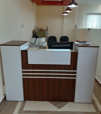 Furniture Mart Furniture Kenya Reception Desk Prices in Kenya; Reception desk, reception table, reception counter, office reception desk, office reception table, reception furniture, reception counter desk, front office desk, front desk, front office reception desk, reception workstation, receptionist desk, receptionist workstation, reception office furniture, office reception furniture, reception area furniture, lobby reception desk, reception lobby furniture, office lobby desk, welcome desk, welcome counter, customer reception desk, client reception desk, visitor reception desk, information desk, customer service desk, office front desk, reception counter Kenya, reception desk Kenya, reception table Kenya, reception furniture Kenya, office furniture Kenya, reception desk Nairobi, reception table Nairobi, reception furniture Nairobi, office reception furniture Nairobi, executive reception desk, luxury reception desk, premium reception desk, modern reception desk, contemporary reception desk, minimalist reception desk, designer reception desk, stylish reception desk, elegant reception desk, wooden reception desk, executive wooden reception desk, laminated reception desk, MDF reception desk, melamine reception desk, commercial reception desk, business reception desk, professional reception desk, heavy duty reception desk, durable reception desk, reception desk with storage, reception desk with drawers, reception desk with lockable drawers, reception desk with filing cabinet, reception desk with shelves, reception desk with cabinet, reception desk with keyboard tray, reception desk with cable management, reception desk with cable ports, reception desk with transaction counter, reception desk with raised counter, reception desk with writing surface, reception desk with spacious worktop, reception desk with spacious countertop, reception desk with privacy panel, reception desk with modesty panel, reception desk with LED front panel, reception desk with decorative front panel, reception desk with company branding space, reception desk with premium finish, reception desk with wood grain finish, reception desk with scratch resistant surface, reception desk with moisture resistant finish, reception desk with durable laminate, reception desk with reinforced frame, reception desk with sturdy construction, reception desk with stable base, reception desk with premium craftsmanship, reception desk with elegant styling, reception desk with modern aesthetics, reception desk with clean lines, reception desk with practical storage, reception desk with integrated storage, reception desk with lockable storage, reception desk with functional workspace, reception desk with cable organization, reception desk with premium materials, reception desk with quality construction, reception desk with polished finish, reception desk with sophisticated appearance, reception desk with executive appeal, reception desk with professional appearance, reception desk with contemporary design, reception desk with stylish office look, reception desk for offices, reception desk for corporate offices, reception desk for startups, reception desk for coworking spaces, reception desk for businesses, reception desk for commercial spaces, reception desk for office reception, reception desk for hotels, hotel reception desk, resort reception desk, reception desk for hospitals, hospital reception desk, reception desk for clinics, clinic reception desk, medical reception desk, dental reception desk, reception desk for pharmacies, reception desk for salons, salon reception desk, beauty salon reception desk, spa reception desk, barber shop reception desk, reception desk for banks, bank reception desk, reception desk for schools, school reception desk, reception desk for colleges, college reception desk, reception desk for universities, university reception desk, reception desk for libraries, reception desk for government offices, reception desk for NGOs, reception desk for retail stores, retail reception desk, showroom reception desk, reception desk for showrooms, reception desk for travel agencies, reception desk for insurance offices, reception desk for law firms, reception desk for accounting firms, reception desk for real estate offices, reception desk for fitness centers, gym reception desk, reception desk for wellness centers, reception desk for conference centers, reception desk for event venues, reception desk for apartment buildings, reception desk for office complexes, reception desk for service centers, reception desk for customer support, reception desk for customer care, reception desk for call centers, reception desk for business centers, reception desk for reception halls, reception desk supplier Kenya, reception desk dealer Kenya, reception desk distributor Kenya, reception desk wholesaler Kenya, reception desk retailer Kenya, reception desk online Kenya, buy reception desk Kenya, reception desk price Kenya, affordable reception desk Kenya, cheap reception desk Kenya, premium reception desk Kenya, best reception desk Kenya, reception desk delivery Kenya, reception desk installation Kenya, reception desk assembly, reception desk warranty, office furniture supplier Kenya, office furniture dealer Kenya, office furniture wholesaler Kenya, office furniture retailer Kenya, office furniture online Kenya, commercial office furniture Kenya, executive office furniture Kenya, business office furniture, corporate office furniture, workspace furniture, office interior furniture, reception furniture supplier Kenya, reception furniture dealer Kenya, reception furniture wholesaler Kenya, reception furniture retailer Kenya, reception furniture online Kenya, office entrance furniture, reception area desk, office welcome furniture, office reception solutions, reception workspace, reception office counter, reception station, reception furniture solutions, reception desk with ergonomic workspace, reception desk with ample legroom, reception desk with integrated office storage, reception desk with secure storage, reception desk with versatile design, reception desk with business class appearance, reception desk with timeless design, reception desk with luxury finish, reception desk with exceptional durability, reception desk with reliable construction, reception desk with commercial grade materials, reception desk with elegant craftsmanship, reception desk with refined office aesthetics, reception desk with executive functionality, reception desk with premium executive styling, reception desk with innovative workspace design, reception desk with stylish contemporary finish, reception desk designed for productivity, reception desk designed for customer service, reception desk designed for business success, reception desk designed for welcoming visitors, reception desk for first impressions, reception desk for office branding, reception desk for professional environments, reception desk for modern workplaces, reception desk for office interiors, reception desk for office renovation, reception desk for office setup, reception desk for workspace organization, reception desk for business productivity, reception desk with practical functionality, reception desk with quality materials, reception desk with long lasting durability, reception desk with robust construction, reception desk with premium quality finish, reception desk with durable engineering, reception desk with optimized workspace, reception desk with efficient storage solutions, reception desk with organizational features, reception desk with secure lockable drawers, reception desk with premium office styling, reception desk with refined appearance, reception desk with elegant office design, reception desk with high performance materials, reception desk with professional workspace layout, reception desk with comfortable working space, reception desk with business efficiency features, reception desk with functional office storage, reception desk with executive office appeal, reception desk with modern office aesthetics, reception desk with dependable performance, reception desk with premium commercial quality, reception desk with stylish workspace appeal, reception desk with superior craftsmanship,