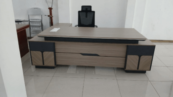 office desk, office desks, executive office desk, executive desk, office table, computer desk, workstation desk, office workstation, office workstation desk, manager desk, director desk, CEO desk, boss office desk, executive office table, home office desk, study desk, writing desk, office furniture, office furniture Kenya, office desk Kenya, office desk Nairobi, office desk for sale, office desk price Kenya, buy office desk online, office desk online Kenya, premium office desk, luxury office desk, imported office desk, modern office desk, contemporary office desk, minimalist office desk, ergonomic office desk, professional office desk, commercial office desk, corporate office desk, wooden office desk, engineered wood office desk, MDF office desk, laminated office desk, solid wood office desk, office desk with drawers, office desk with storage, office desk with cabinet, office desk with filing cabinet, office desk with pedestal, office desk with mobile pedestal, office desk with shelves, office desk with hutch, office desk with lockable drawers, office desk with cable management, office desk with keyboard tray, office desk with modesty panel, office desk with side return, office desk with integrated storage, office desk with spacious work surface, office desk with durable finish, office desk with scratch resistant top, office desk with water resistant surface, office desk with premium finish, office desk with elegant design, office desk with modern aesthetics, office desk with sleek appearance, office desk with contemporary styling, office desk with quality craftsmanship, office desk with premium materials, office desk with reinforced frame, office desk with sturdy construction, heavy duty office desk, durable office desk, office desk built to last, office desk investment, office desk with steel frame, office desk with metal legs, office desk with wooden legs, office desk with adjustable feet, office desk with spacious drawers, office desk with ample storage, office desk with secure storage, office desk with lock and key drawers, office desk with document storage, office desk with office organization features, L shape office desk, L shaped executive desk, corner office desk, straight office desk, rectangular office desk, compact office desk, small office desk, large office desk, executive workstation, height adjustable office desk, adjustable office desk, electric standing desk, manual standing desk, sit stand desk, office desk for executives, office desk for managers, office desk for directors, office desk for staff, office desk for receptionists, office desk for accountants, office desk for lawyers, office desk for architects, office desk for engineers, office desk for consultants, office desk for programmers, office desk for designers, office desk for customer service, office desk for startups, office desk for businesses, office desk for corporate offices, office desk for commercial spaces, office desk for coworking spaces, office desk for shared offices, office desk for home offices, office desk for remote work, office desk for hybrid work, office desk for schools, office desk for colleges, office desk for universities, office desk for hospitals, office desk for clinics, office desk for banks, office desk for hotels, office desk for government offices, office desk for NGOs, office desk for educational institutions, office desk for office interiors, office desk for office renovation, office desk for workspace optimization, office desk for productivity, office desk for daily use, office desk for modern workplaces, office furniture supplier Kenya, office furniture Nairobi, executive office furniture Kenya, office desk supplier Kenya, office desk showroom Nairobi, office desk shop Kenya, office desk delivery Kenya, office desk installation, office desk assembly, office desk maintenance, office desk accessories, office desk collection, office desk designs, office desk styles, office desk trends, office desk buying guide, office desk manufacturers, office desk wholesalers, office desk retailers, office desk deals Kenya, office desk offers, office desk discounts, office desk sale, affordable office desk, best office desk Kenya, quality office desk, stylish office desk, elegant office desk, black office desk, white office desk, brown office desk, walnut office desk, oak office desk, mahogany office desk, executive furniture Kenya, workspace furniture, workspace desk, professional workspace furniture, ergonomic workstation desk, office workstation furniture, office desk solutions Kenya, office furniture solutions, imported office furniture Kenya, commercial office furniture Kenya, office desk with business class design, office desk with executive appeal, office desk with sophisticated style, office desk with practical functionality, office desk with refined craftsmanship, office desk with reliable performance, office desk with commercial grade durability, office desk with premium office styling, office desk with functional workspace, office desk with superior durability, office desk with timeless elegance, office desk with versatile design, office desk with premium office organization, office desk with innovative storage solutions, office desk with professional appearance, office desk with stylish finish, office desk with decorative wood grain, office desk with premium laminate, office desk with reinforced construction, office desk with modern office appeal, office desk with luxury executive finish, office desk for organized workspaces, office desk for productive environments, office desk optimized for workflow, office desk for business success, office desk with ergonomic workspace layout, office desk with practical office storage, office desk with efficient organization, office desk with premium executive quality, office desk with exceptional craftsmanship, office desk with outstanding quality, office desk with modern workplace aesthetics, office desk designed for professionals, office desk with premium office functionality, office desk with high quality finish, office desk for executive suites, office desk for administration offices, office desk for finance departments, office desk for HR offices, office desk for creative studios, office desk for technology companies, office desk with advanced workspace features, office desk for office furniture projects, office desk furniture store Kenya, office desk online shopping Kenya, office desk wholesale Kenya, office desk retail Kenya, office desk furniture specialists, office desk furniture experts, office desk for premium business interiors, office desk with durable office construction, office desk with luxury office appeal, office desk crafted for performance, office desk with superior workspace comfort, office desk with elegant office styling, office desk with refined office aesthetics, office desk with secure file storage, office desk for modern business environments, office desk with premium commercial quality, office desk with exceptional value, office desk with long lasting durability, office desk for growing businesses, office desk with smart office organization, office desk with beautiful wood finish, office desk with contemporary executive style, office desk for productive office layouts, office desk with stylish workspace appearance, office desk with premium residential office appeal, office desk with innovative office design, office desk for premium workspace solutions, office desk optimized for efficiency, office desk with functional elegance, office desk with attractive executive design, office desk with professional craftsmanship, office desk with reliable office performance, office desk with executive workspace functionality, office desk with sophisticated business appeal, office desk with premium storage capacity, office desk for everyday professional use, office desk with elegant commercial styling, office desk with superior office organization, office desk with quality office construction, office desk with modern furniture design, office desk with timeless professional appeal,